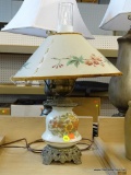 ANTIQUE TABLE LAMP; HAS A FROSTED GLASS CHIMNEY, A BRASS TOP, SUNFLOWER PAINTED MILK GLASS BODY AND