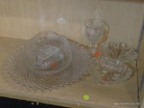 PARTIAL SHELF LOT OF ASSORTED GLASSWARE; THIS 5 PIECE LOT INCLUDES: A CUT GLASS WINE GLASS, A CAKE