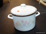 ENAMELWARE COVERED POT; DOUBLE-HANDLED WHITE ENAMELWARE POT WITH LID. FEATURES PINK, ORANGE, YELLOW