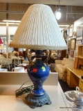 PORCELAIN TABLE LAMP; COBALT BLUE AND GOLD TABLE LAMP THAT RESEMBLES A VASE WITH ITS DOUBLE-HANDLE