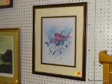 FRAMED BIRD PRINT; CLOSEUP DEPICTION OF A PAIR OF CARDINALS SITTING IN A TREE WITH WHITE FLOWERS.
