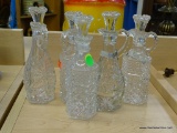 VINEGAR CRUET LOT; INCLUDES 5 TOTAL PRESSED GLASS VINEGAR CRUETS EACH WITH STOPPERS. TALLEST