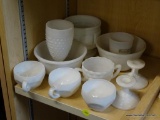 MILK GLASS LOT; INCLUDES A PAIR OF MILK GLASS CANDLESTICK HOLDERS, A HOBNAIL GOBLET, 3 TEA CUPS, A