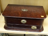 JEWELRY BOX; MAHOGANY LIDDED JEWELRY BOX WITH BRASS HARDWARE. IS MISSING 1 PILL. MEASURES 14 IN X 10