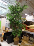 ARTIFICIAL FICUS; IS IN A BROWN PLANTER AND MEASURES 7 FT TALL