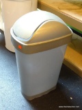 GRAY TRASH CAN; GRAY TRASH CAN WITH REVOLVING TOP LID. MEASURES 25 IN TALL
