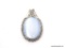 LADIES .925 STERLING SILVER MOTHER OF PEARL PENDANT. MEASURES 1-3/4 IN. BY 1/2 IN. WEIGHS 9.5 GRAMS.