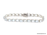 LADIES .925 STERLING SILVER 11 CT. BLUE TOPAZ BRACELET. WEIGHS 15.5 GRAMS.