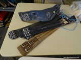 LOT OF SMALL USED GIRTHS; THIS 4 PIECE LOT INCLUDES: A BLACK, SHAPED LEATHER OVATION GIRTH MEASURING