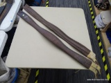 TWO USED 51 IN SHAPED LEATHER GIRTHS; TWO TWO-TONED BROWN LEATHER GIRTHS. READ 50 IN BUT MEASURE 51