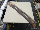 TWO USED 49 IN SHAPED LEATHER GIRTHS; TWO DARK BROWN GIRTHS THAT MEASURE APPROXIMATELY 49 IN FROM