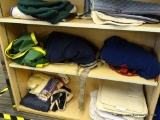 SHELF LOT OF HORSE BLANKETS; INCLUDES 3 TOTAL PIECES. 1 IS MADE BY HORSEWARE (IRELAND).