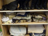 SHELF LOT OF RIDING CLOTHES; THIS LOT INCLUDES AN ASSORTMENT OF RIDING PANTS AND RIDING BLOUSES IN