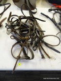 LOT OF ASSORTED HORSE TACK; THIS 6 PIECE LOT INCLUDES ONE BRIDLE, AND 5 ASSORTED STRAPS OF BRIDLES.