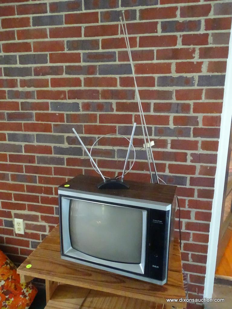 VINTAGE COLORTRAK TV; FEATURES TWO ANTENNAS WITH Proxibid
