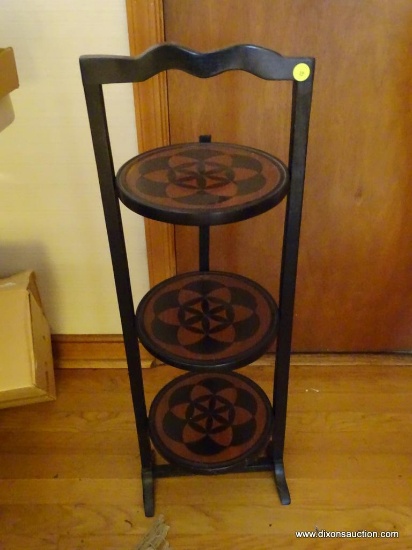 (LR) ANTIQUE PIE STAND; 3 TIERED MAHOGANY STAND WITH FLORAL PATTERN INLAY. MEASURES 25 IN TALL