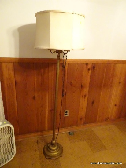 (DEN) VINTAGE FLOOR LAMP; CREAM COLORED BELL SHAPED SHADE SITTING ON A 3-CANDLE STICK STYLE BRONZE