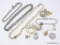 LOT OF ASSORTED COSTUME JEWELRY; LOT INCLUDES A FAUX PEARL NECKLACE, 2 SILVER TONED CHAINS, A SILVER