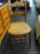 VINTAGE WOOD ACCENT CHAIR; LADDER BACK WITH RATTAN SEAT, FOUR LEGS. MEASURES 17 IN X 16 IN X 32.5