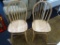 PAIR OF KITCHEN CHAIRS; NATURAL WOOD, ROUNDED BACK ON 4 LEGS. MEASURES 17 IN X 17.5 IN X 36.5 IN.