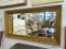 ANTIQUE FRAMED MIRROR; BEVELED GLASS MIRROR WITH A 2 IN BEVEL AND GOLD GILT FRAME. MEASURES 46 IN X