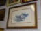 DUCK PRINT; DEPICTS A PAIR OF WOOD DUCKS RESING ON A FALLEN TREE. IS SIGNED BY THE ARTIST IN THE