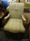 VINTAGE ARMCHAIR; FEATURES CREAM UPHOLSTERY VERTICALLY STRIPED WITH GREEN, MAROON, PINK, AND LIGHT