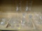 PARTIAL SHELF LOT OF ASSORTED GLASSWARE; THIS 15 PIECE LOT INCLUDES 6 SMALL GLASSES, 4 SMALL STEMMED