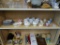 SHELF LOT OF ASSORTED CHINA; THIS 24 PIECE LOT INCLUDES DECORATIVE PLATES, A COFFEE SET, DECORATIVE