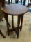 END TABLE; ROUND CROSS-STRETCHER BASE END TABLE WITH TURNED POST LEGS. MEASURES 17 IN X 25 IN