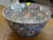 DECORATIVE ORIENTAL BOWL; FEATURES PAINTINGS OF FRUIT, FLOWERS, BUTTERFLIES, AND JAPANESE PEOPLE.