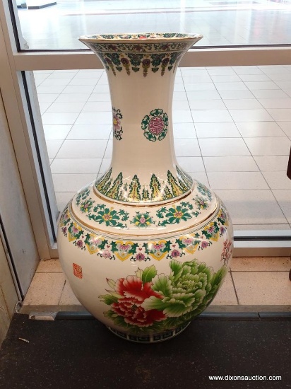 LARGE CHINESE PALACE VASE; WHITE PORCELAIN WITH FLORAL PATTERN IN SHADES OF VIOLET, GREEN, AND