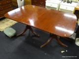 DINING TABLE; DOUBLE PEDESTAL DUNCAN PHYFE DINING TABLE WITH BRASS CAPPED PAW FEET AND THREE 12 IN