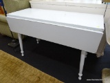 VINTAGE WOODEN DROP LEAF TABLE; PAINTED IN A VERY PALE SEA BLUE COLOR WITH CHIPPING. MARKED ON THE