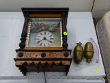 ANTIQUE WOOD WALL CLOCK WITH BRASS WEIGHTS; INCLUDES 2 BRASS WEIGHTS. THE BACK IS DETACHABLE TO GET