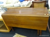 ANTIQUE WOOD DROP LEAF TABLE; 6 LEGS, TABLE NEEDS LEGS SCREWED TO THE BASE, MEASURES 45 IN X 33.5