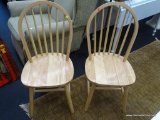 PAIR OF KITCHEN CHAIRS; NATURAL WOOD, ROUNDED BACK ON 4 LEGS. MEASURES 17 IN X 17.5 IN X 36.5 IN.