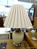 TABLE LAMP; FEATURING A ROUND FINIAL, A BELL SHAPED IVORY LAMP SHADE, BRASS WITH TAUPE CIRCULAR