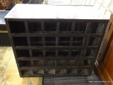 WOODEN WINE RACK; BLACK WOODEN WINE RACK WITH LATTICE DETAILING TO HOLD 30 BOTTLES. PIECE SITS ON