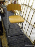 COLLAPSIBLE BAR STOOL; FEATURES A WOODEN SEAT AND SEAT BACK, A GREY METAL FRAME, AND A BLACK