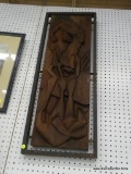 CARVED WOOD WALL HANGING; THICK WOOD CARVING THAT APPEARS TO DEPICT TWO DISTORTED HUMAN FIGURES.