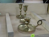 PARTIAL SHELF LOT OF CANDLESTICK HOLDERS; INCLUDES A PAIR OF BRASS DISH BASE CANDLE HOLDERS AND A