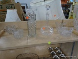PARTIAL SHELF LOT OF ASSORTED GLASSWARE; THIS 6 PIECE LOT INCLUDES A RECTANGULAR VASE WITH A FROSTED