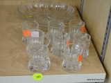 PARTIAL SHELF LOT OF GLASSWARE; THIS 9 PIECE LOT INCLUDES A NUT DISH AND 8 HANDLED BUTTER PATS.
