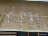 PARTIAL SHELF LOT OF GLASSWARE; THIS 14 PIECE LOT INCLUDES AN ASSORTMENT OF STEMMED GLASSWARE OF