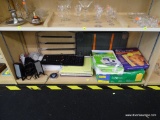 SHELF LOT OF ASSORTED OFFICE SUPPLIES; INCLUDES AN HP KEYBOARD, A PAIR OF DELL COMPUTER SPEAKERS,