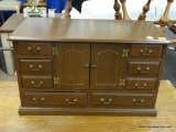 JEWELRY BOX; FEATURES A CENTER CABINET THAT OPENS TO REVEAL 4 BLUE FELT-LINED DRAWERS WITH SEPARATE