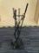 BLACK CAST IRON FIREPLACE SET; FEATURES BROOM, SCISSOR HANDLED LOG MOVERS, AND TWO SHOVELS. MEASURES