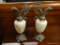 PAIR OF DECORATIVE VICTORIAN EWERS; FEATURING A PAINTED FLORAL DESIGN ON GLASS BODY WITH CAST METAL