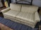 FLORAL LOVESEAT; FLORAL AND STRIPE UPHOLSTERED 2 CUSHION LOVE SEAT. IS VERY COMFORTABLE! IS IN